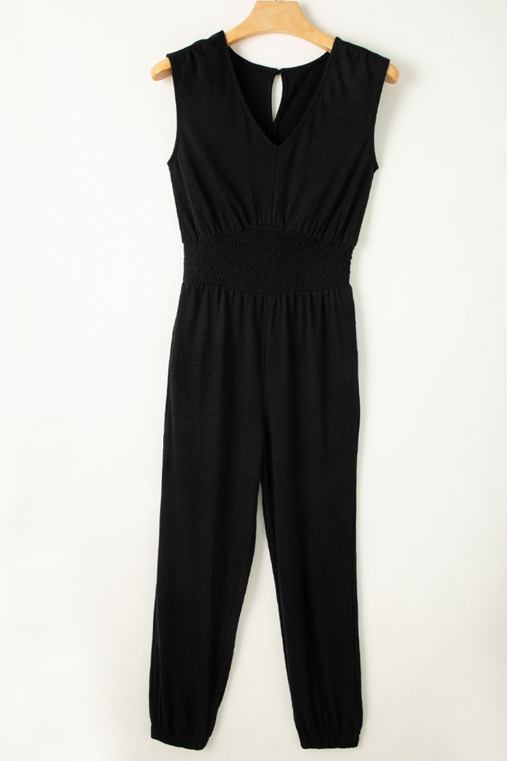 Black textured ribbed waist jumpsuit with V-neck and keyhole detail