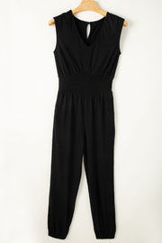 Black textured ribbed waist jumpsuit with V-neck and keyhole detail