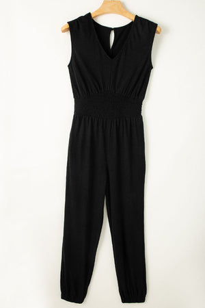 Black textured ribbed waist jumpsuit with V-neck and keyhole detail