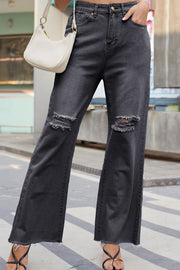 Dark wash distressed knee flare denim jeans with frayed hem