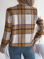 Collarless plaid cropped jacket in camel with white and black accents, long sleeves.