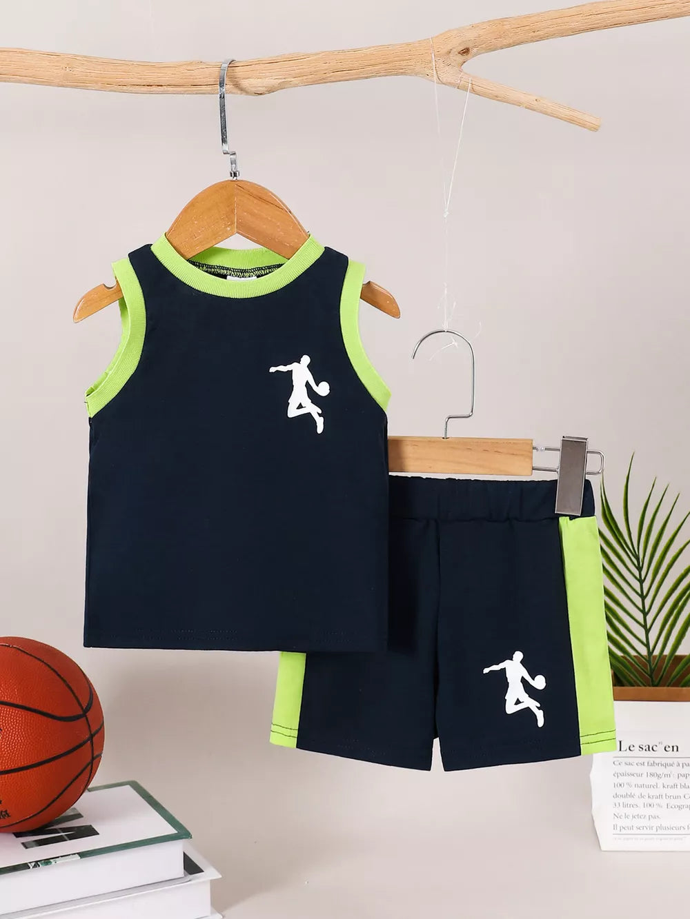 Navy basketball tank and shorts set with lime green trim and white basketball player graphic.