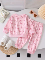 Pink baby set with bow print sweatshirt and pants, crewneck, long sleeves, elastic waistband and cuffs.