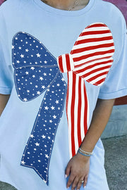 Light blue cotton blend t-shirt dress with a patriotic bow graphic featuring stars and stripes.