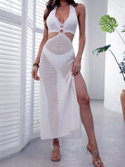 White halter neck crochet maxi cover-up with ring detail and high slit.