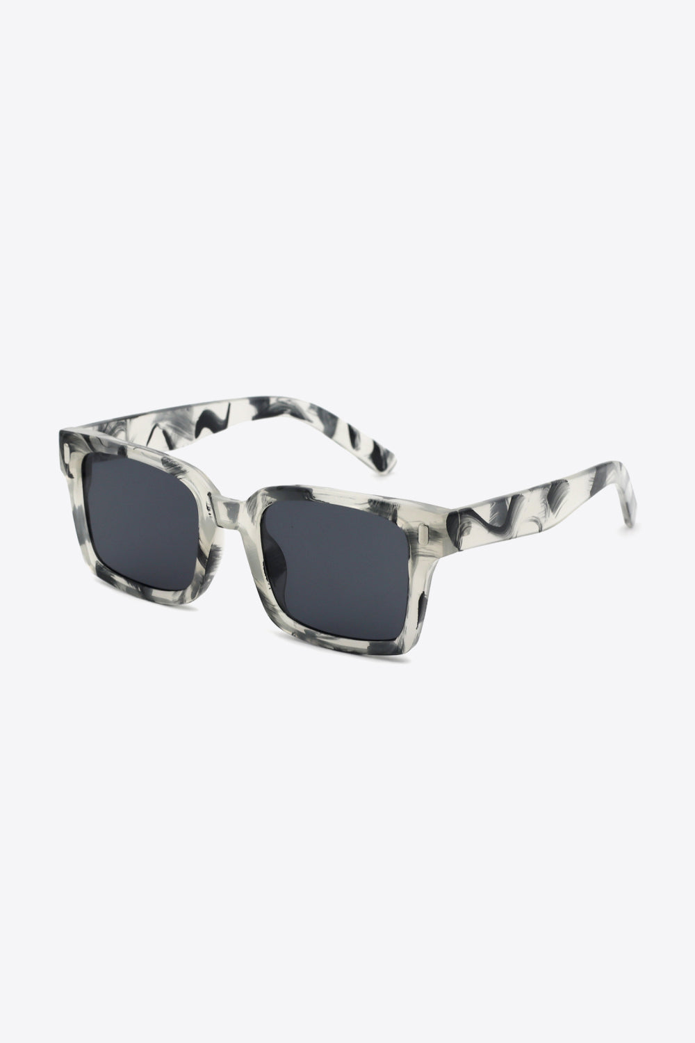 Marble effect rectangular sunglasses with dark lenses and bold frames.