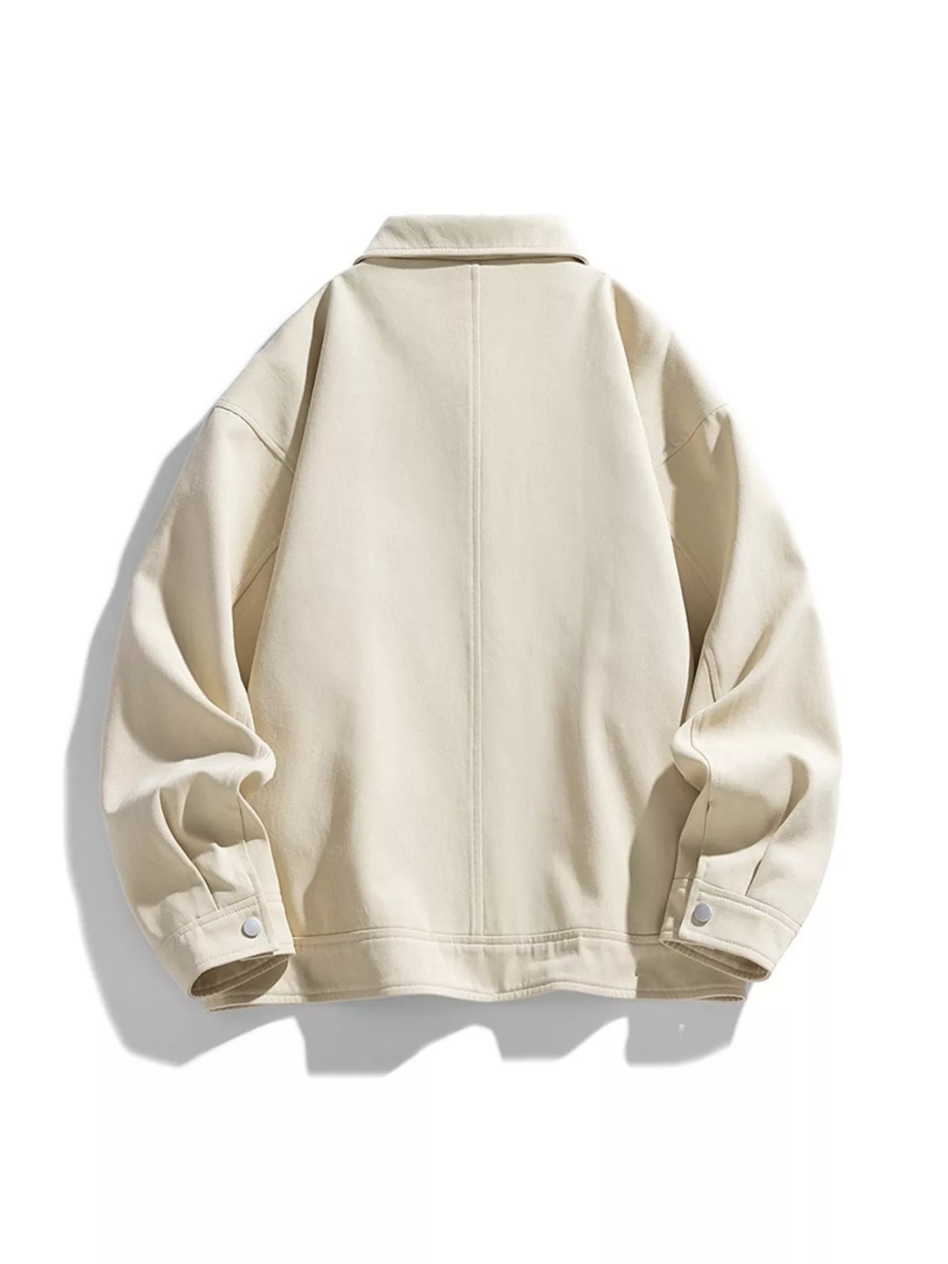 Oversized casual snap jacket in apricot with buttoned cuffs and a classic collar.