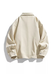 Oversized casual snap jacket in apricot with buttoned cuffs and a classic collar.