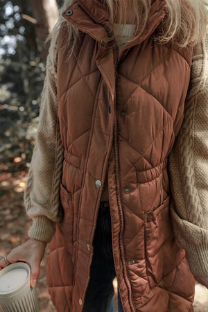 Brown diamond quilted longline vest with cinched waist detail and pockets