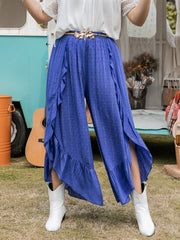 Azure ruffle overlay palazzo trousers in royal blue viscose with gold polka dots and side slits.