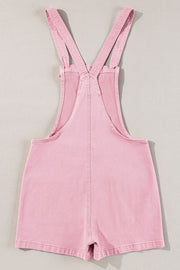 Blush pink denim short overalls with adjustable straps and a casual cut.