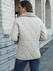 White quilted jacket with sherpa collar and drawstring waist