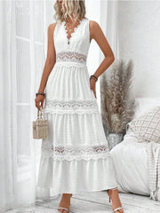 White lace trim Swiss dot maxi dress with tiered skirt and V-neckline.