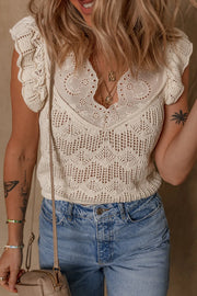 Beige crochet knit vest with eyelet yoke detail and ruffled cap sleeves