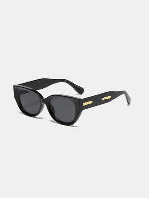 Black sculpted cat eye sunglasses with gold accents on the temples.