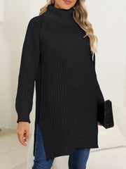 Black knit turtleneck sweater with asymmetric hemline and side slits, styled casually.