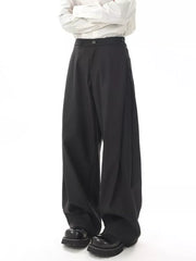 Black flowy wide-leg sweatpants for men with a relaxed fit and button closure.