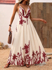 Maxi dress with deep V-neck, floral print, and a-line cut.
