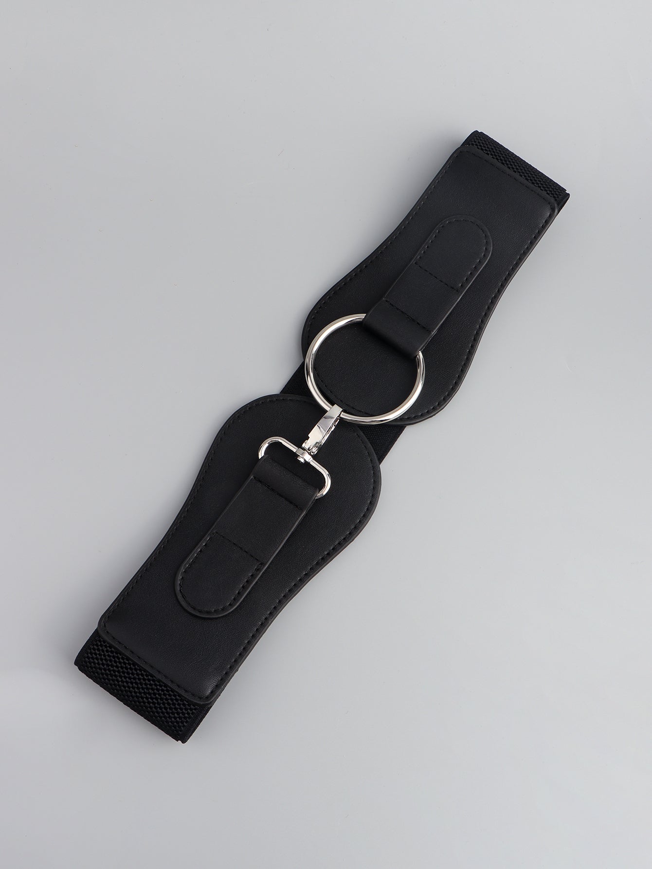 Black elastic belt with sculpted faux leather panels and silver ring buckle detail