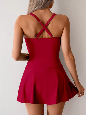 Wine Red one-piece swimsuit with criss-cross back straps and a flared skirt.