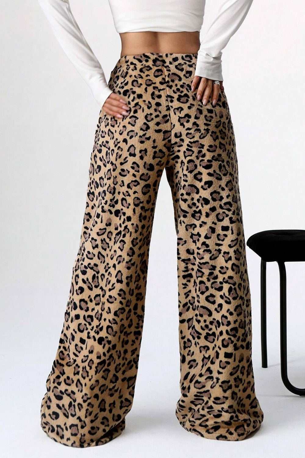 Leopard plush palazzo lounge pants with a wide leg and comfortable fit.