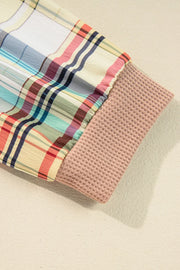 Raglan plaid cuff henley top in tan with pink waffle knit cuff detail.