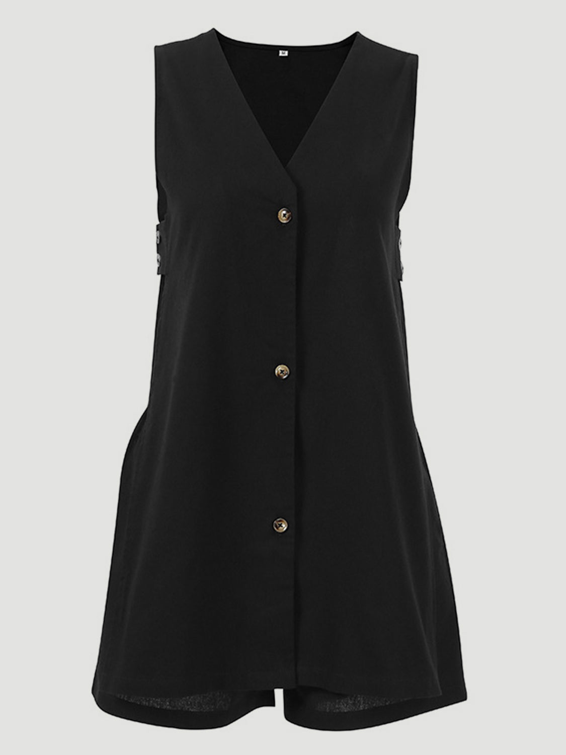 Black linen co-ord set with V-neck, button front, and cut-out back detail.