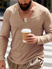 Casual ribbed long sleeve t-shirt in Apricot with a deep V-neck, worn by a man holding a coffee cup.