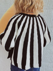 Bold stripe knit cardigan in black and white acrylic with a button-up front.