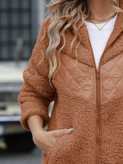 Caramel teddy hoodie with quilted panel detail and zipper closure.