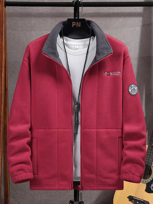 Men's red fleece zip-up jacket with grey collar and embroidered patch detail.
