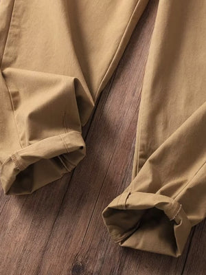 Men's tan loose fit sweatpants with cuffed hems.