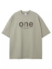 Sage oversized cotton t-shirt with "one" graphic and text detail