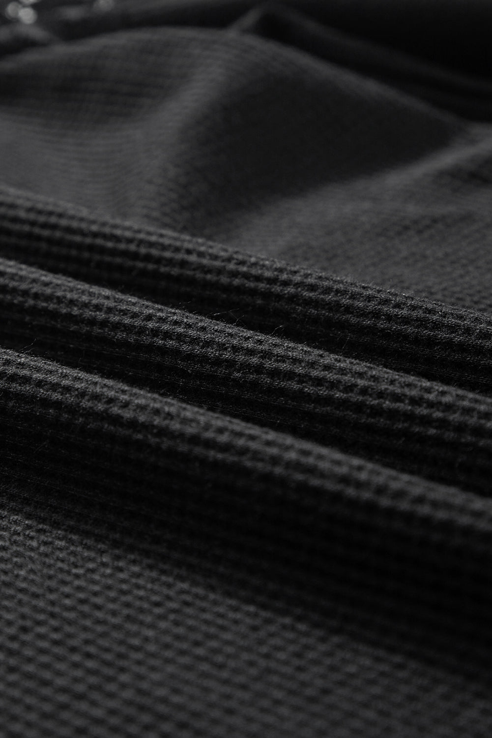 Black waffle knit raglan top with lace yoke detail
