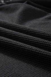 Black waffle knit raglan top with lace yoke detail