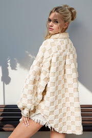 Textured checkered shacket in cream with corduroy trim and frayed hem.