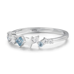 Silver ring with star and celestial cluster zircon details