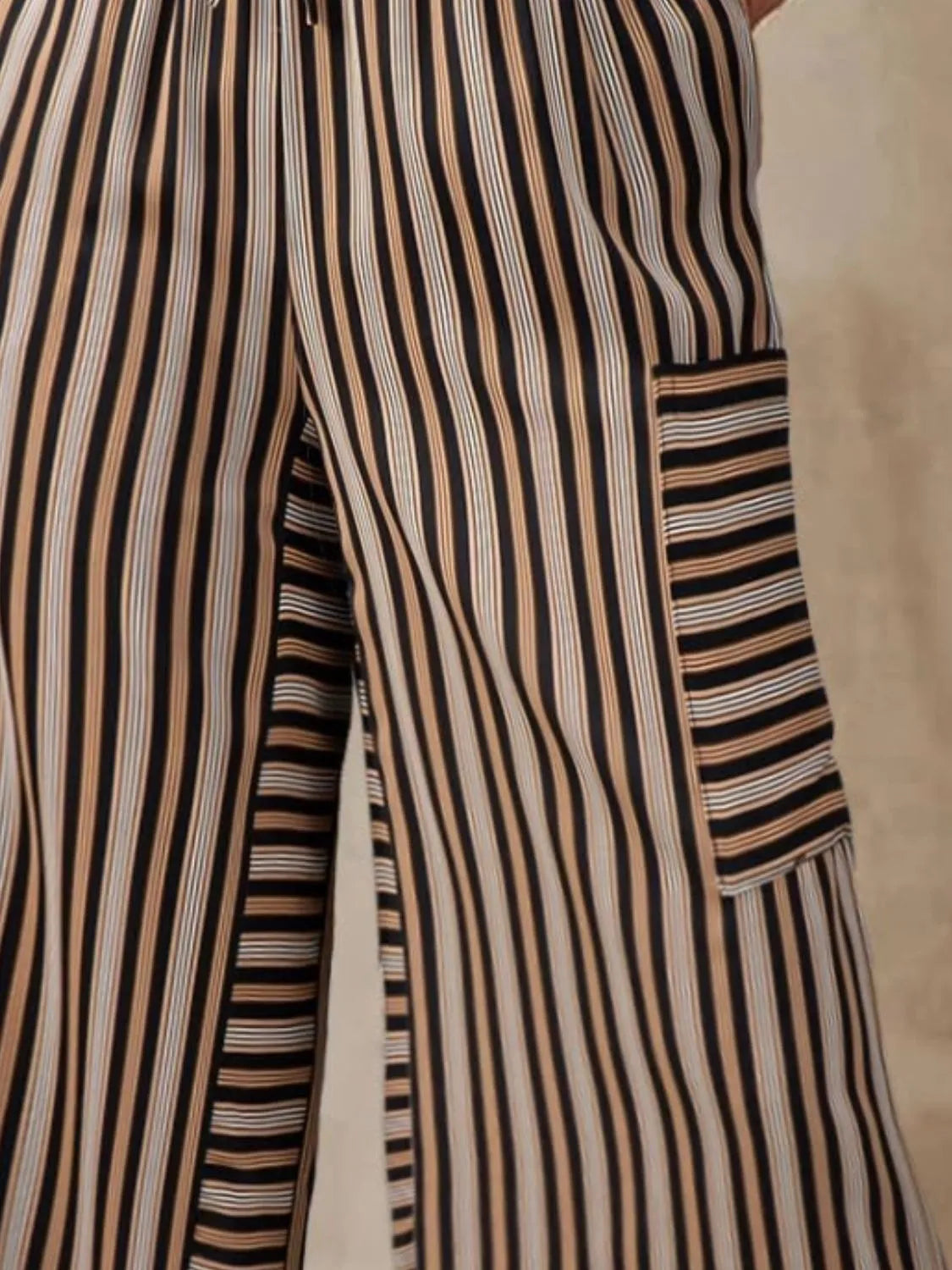 Coastal Stripe Cargo Culottes in black with tan and white stripes, featuring a cargo pocket detail.