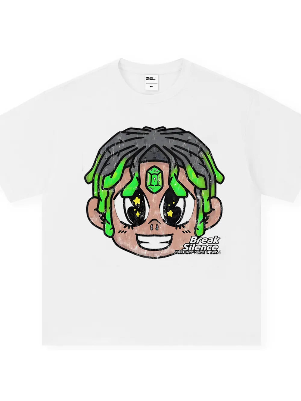 White cotton oversized t-shirt with cartoon graphic of a face with green dreadlocks and gemstone detail.