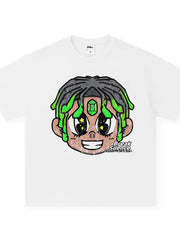 White cotton oversized t-shirt with cartoon graphic of a face with green dreadlocks and gemstone detail.