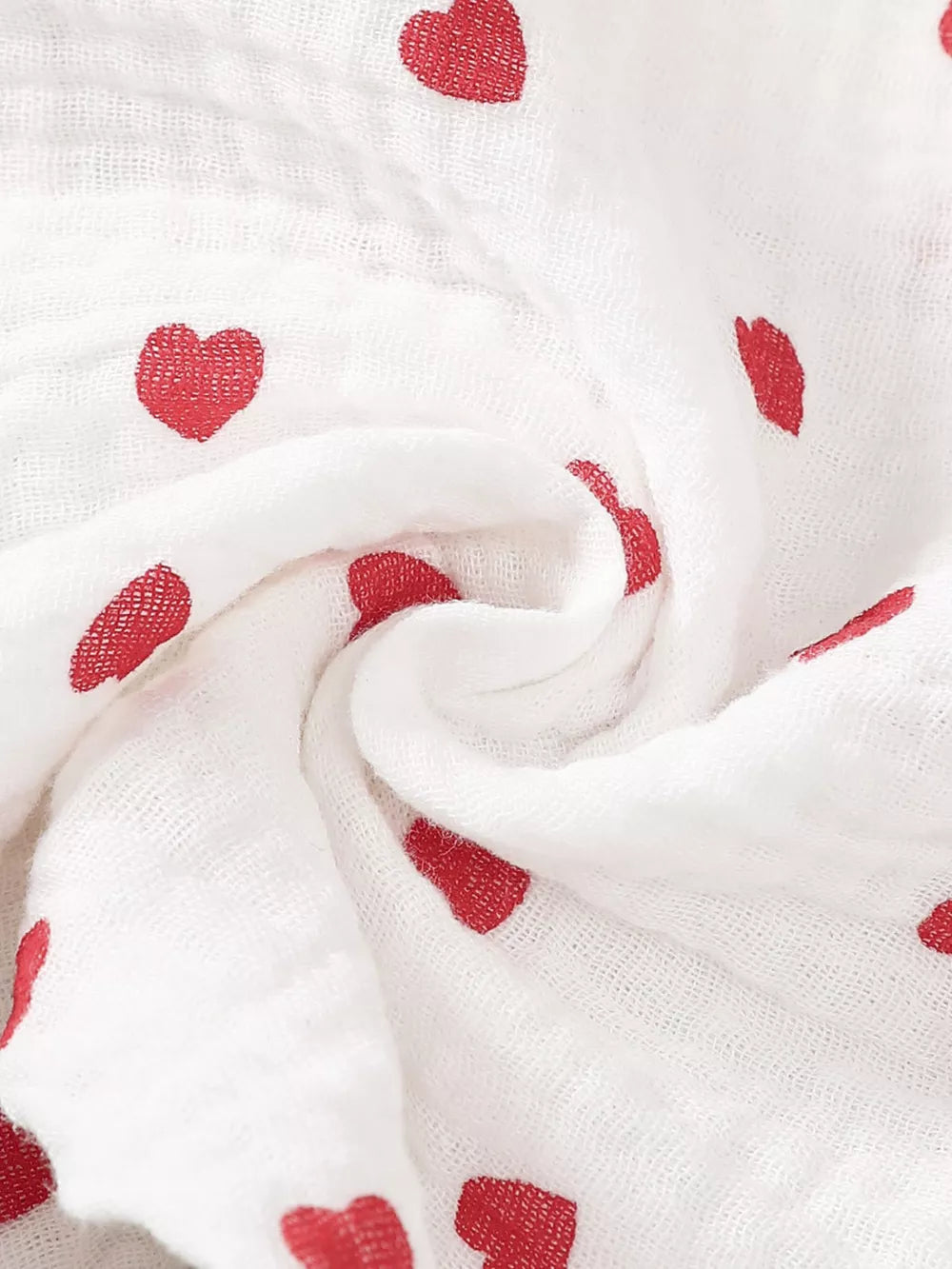White cotton baby outfit with red heart print and headband detail