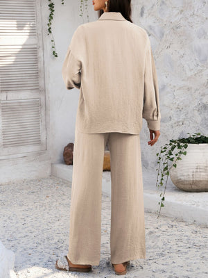 Tan textured resort shirt and wide leg pants set with buttoned front and collared neckline.