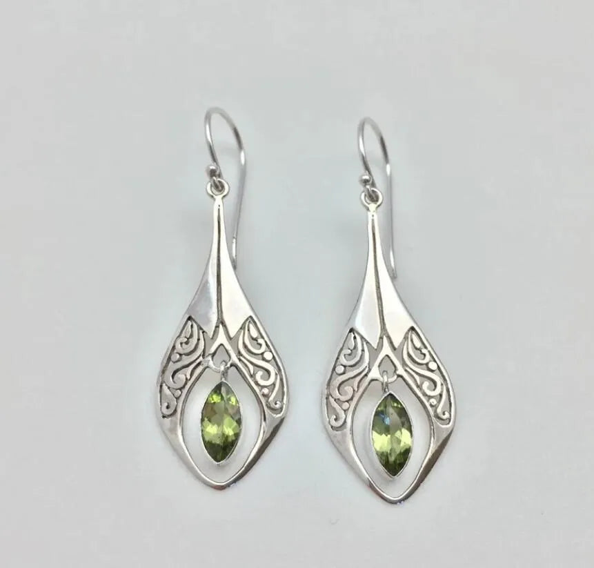 Silver filigree pear-drop peridot earrings with cutout detail