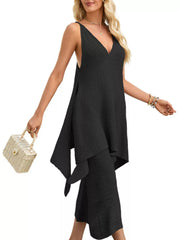 Black asymmetrical hem two-piece set with V-neck top and wide-leg pants.