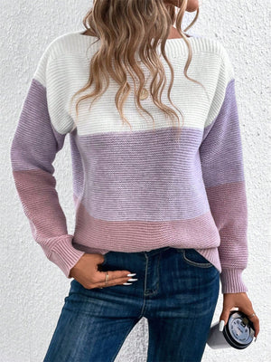 Colorblock boatneck knit sweater in white, lavender, and pink stripes.