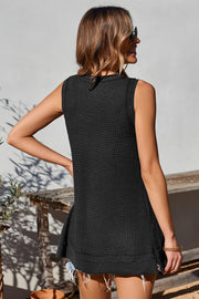 Black waffle knit tank top with asymmetric hem and raw edge detail