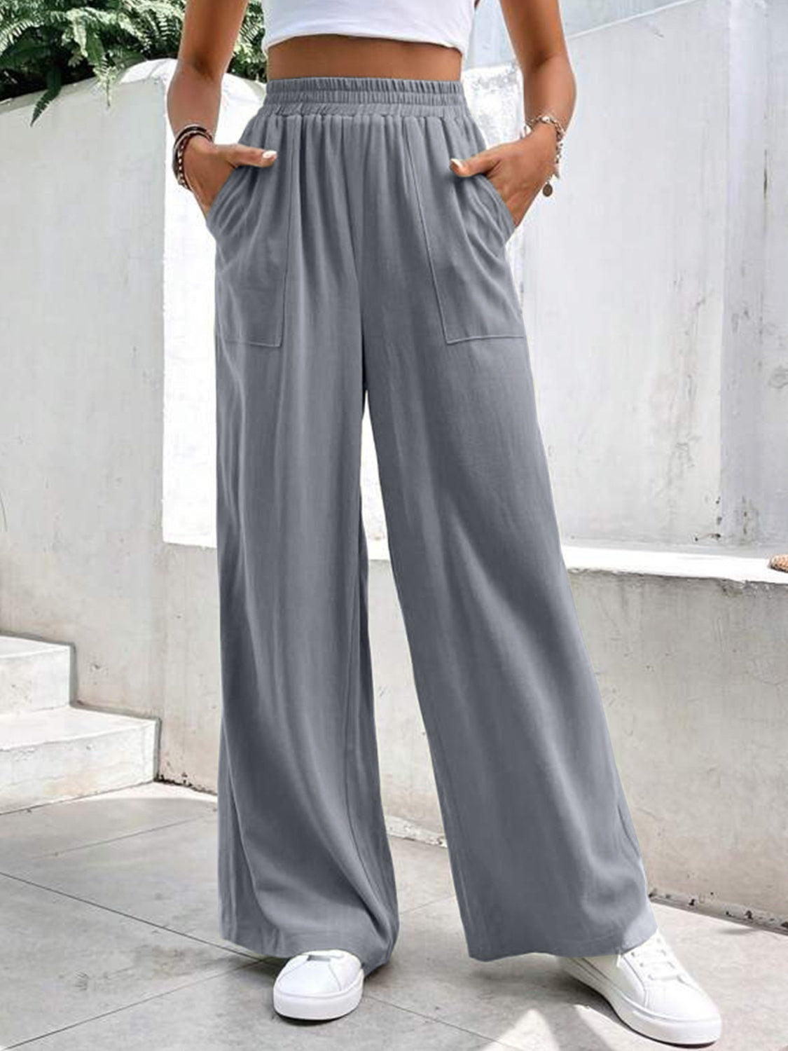 Gray relaxed drape palazzo trousers with pockets and elastic waist