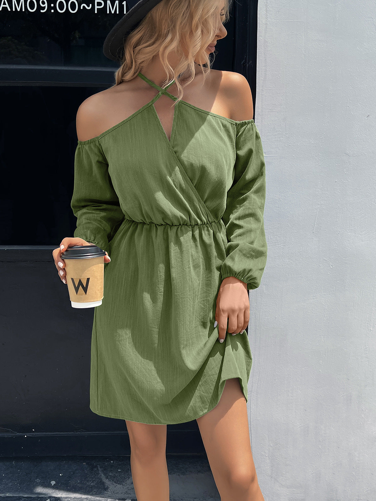Cross-strap off-shoulder mini dress in Matcha Green with long sleeves and cinched waist.