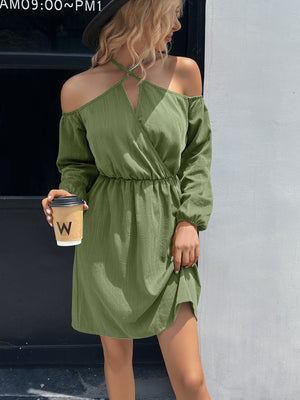 Cross-strap off-shoulder mini dress in Matcha Green with long sleeves and cinched waist.