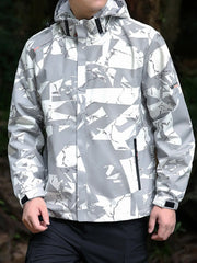 Plus-size windbreaker jacket in white and gray abstract pattern with zip pockets and adjustable cuffs.